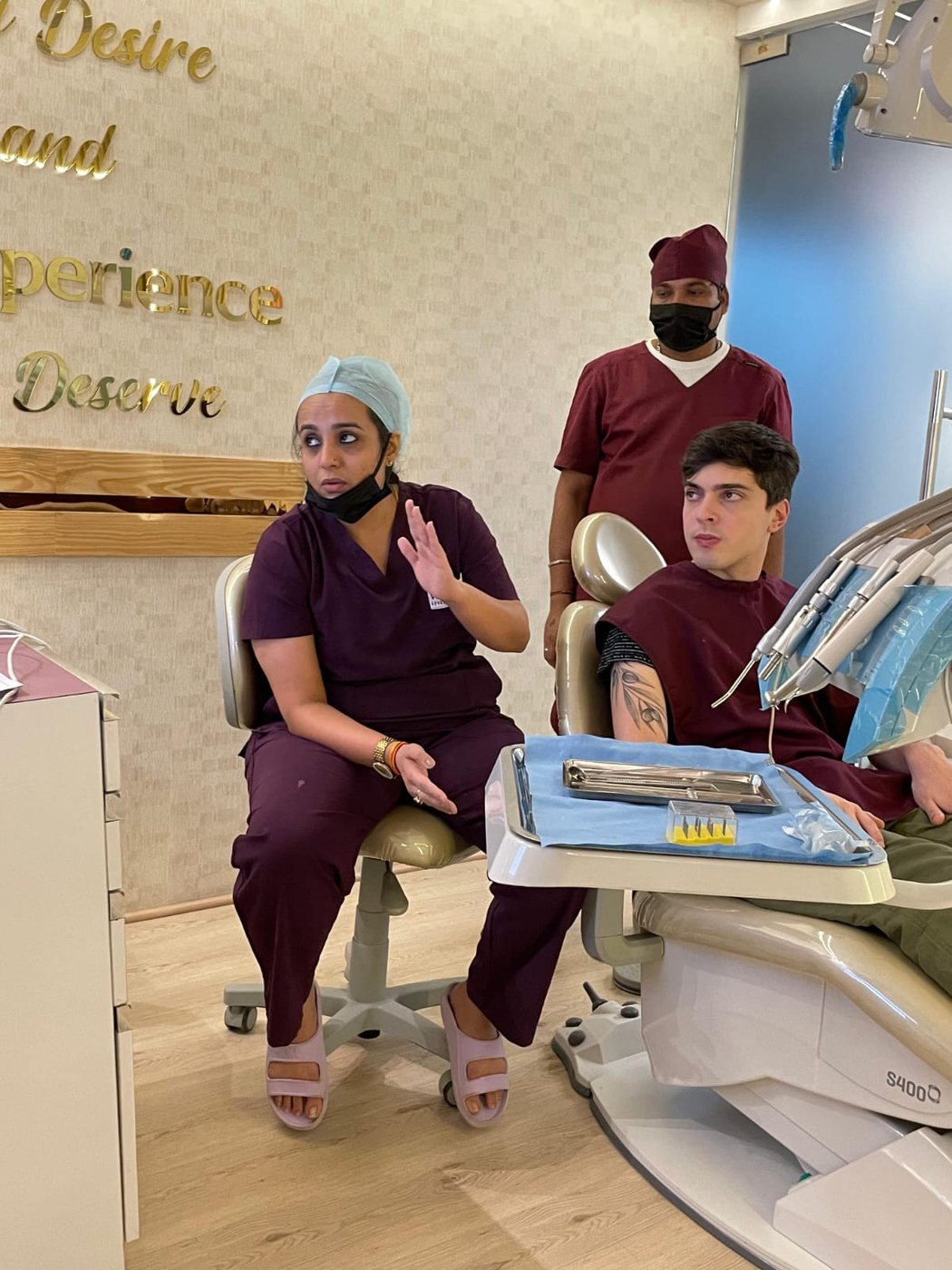 Our team with a patient at VIN SMILES